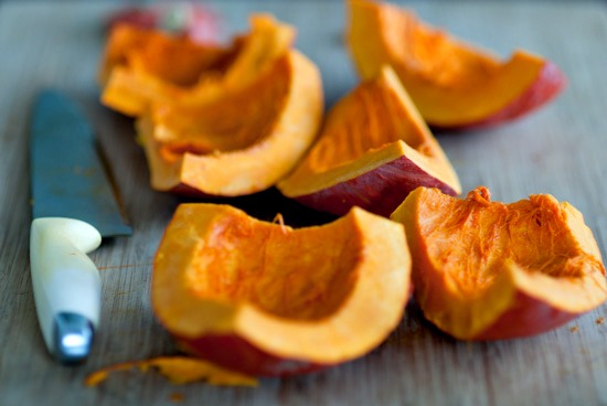 making squash puree sliced red kuri squash