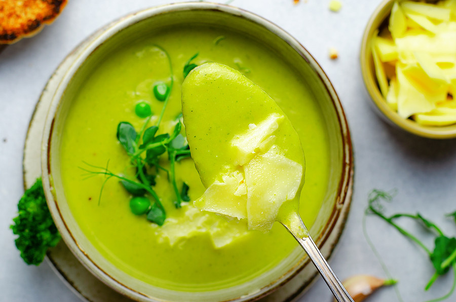 Pea soup with fresh garden vegetables.