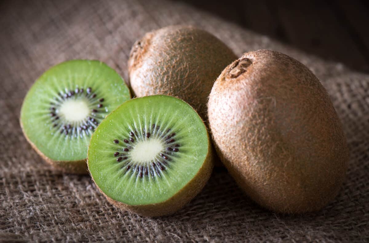 Kiwi fruit on wooden background