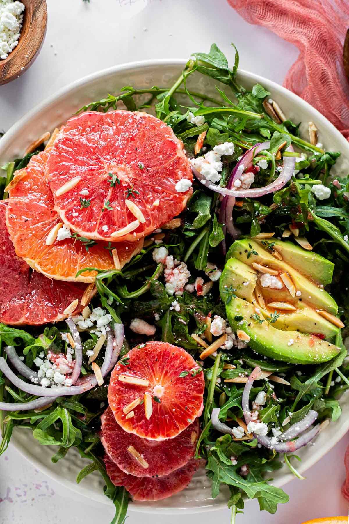 Winter Citrus Salad with blood oranges, cara cara oranges, and grapefruit, vertical view.